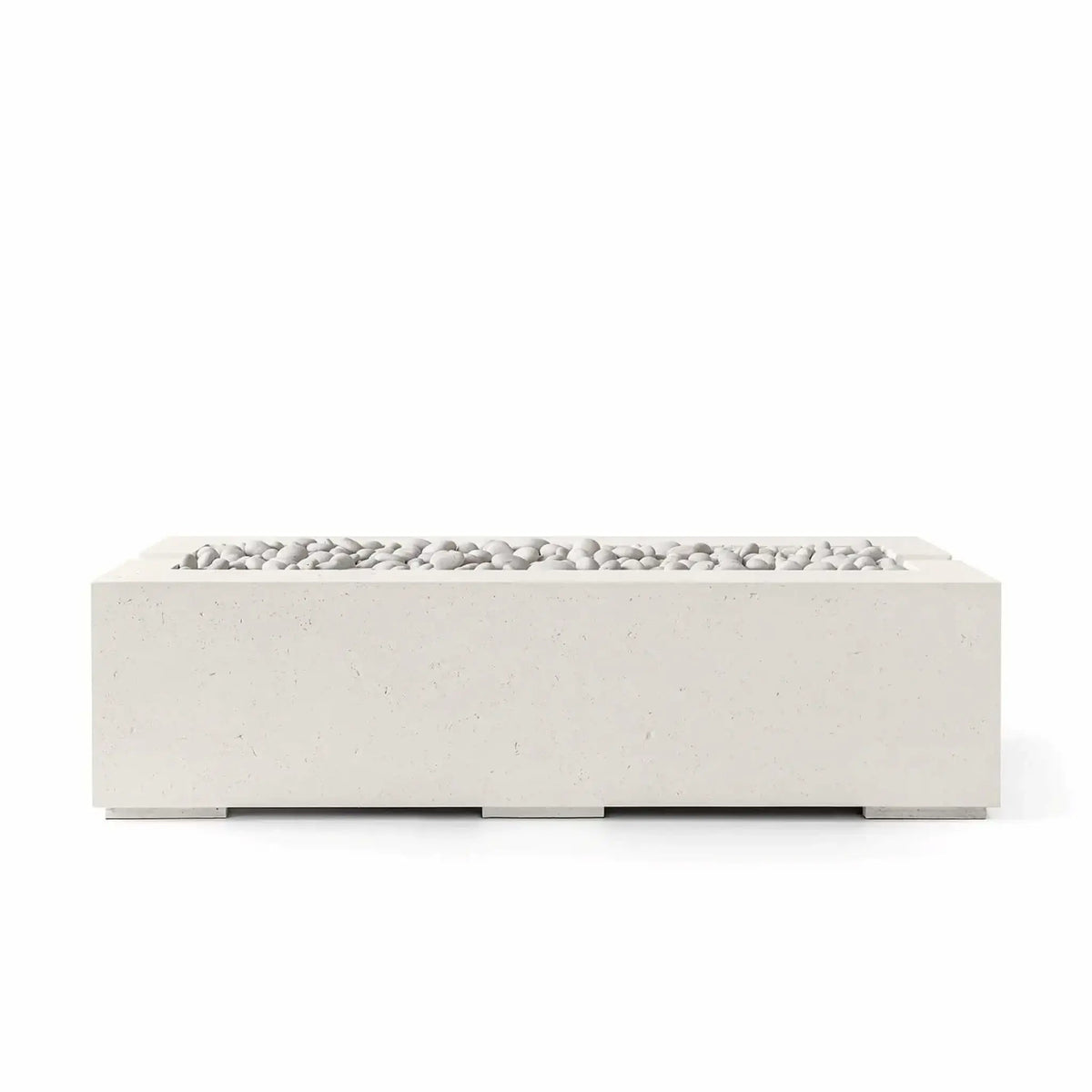 Studio product image of the HPC Fire Hearth Products Controls Dekko GFRC Concrete Avera 60 x 26 Fire Pit in Limestone finish with Ivory Stone media. The modern rectangular fire pit features durable glass fiber reinforced concrete construction, clean contemporary lines, and smooth white decorative stones arranged across the recessed burner opening for a refined outdoor aesthetic.