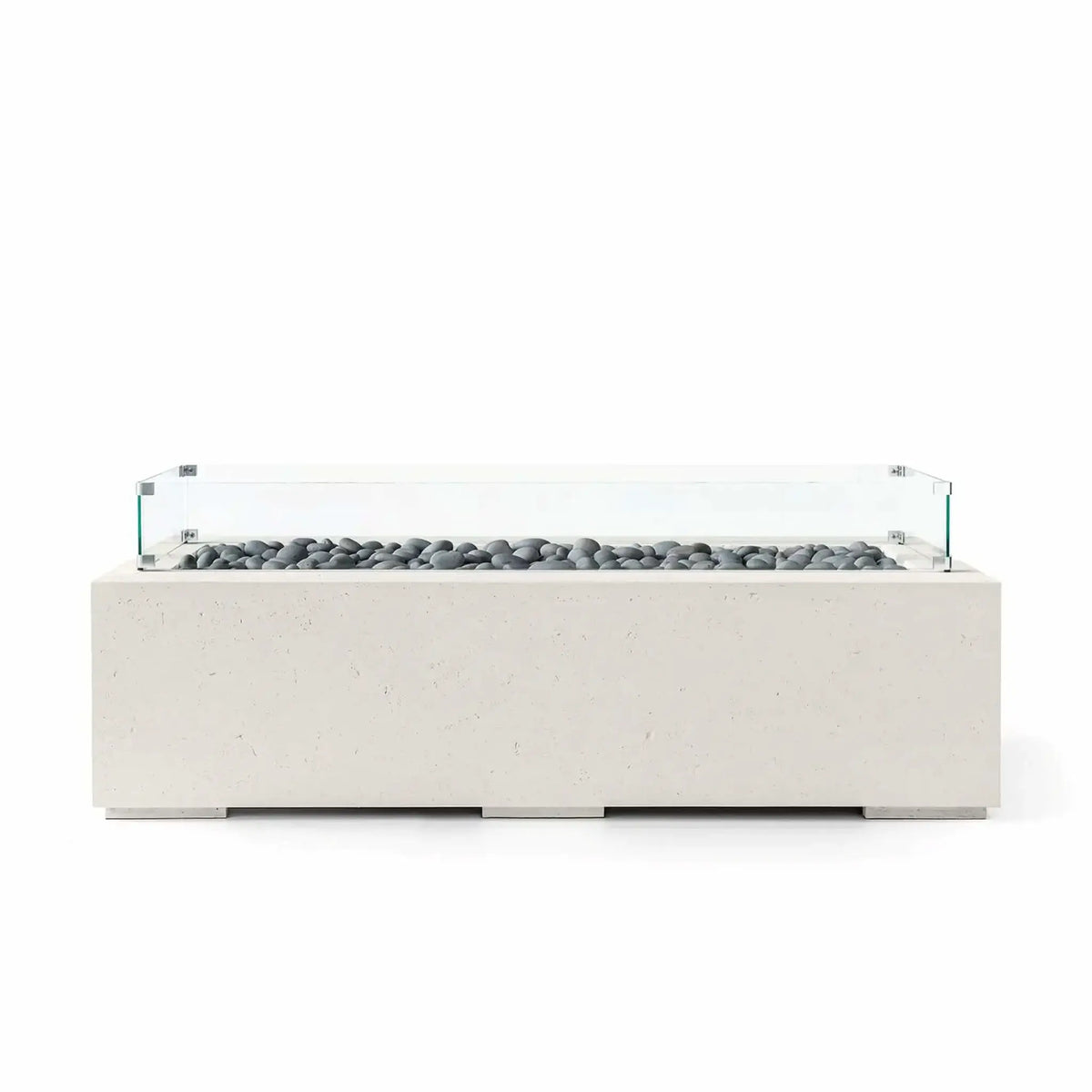 HPC Fire Hearth Products Controls Dekko GFRC Concrete Avera 60 x 26 Fire Pit with a Limestone concrete finish, decorative gray slate stones, and a tempered glass wind guard. The sleek rectangular fire pit features a long linear burner enclosure, low-profile base, and modern architectural styling designed to enhance upscale patios, outdoor seating areas, and contemporary landscape designs.