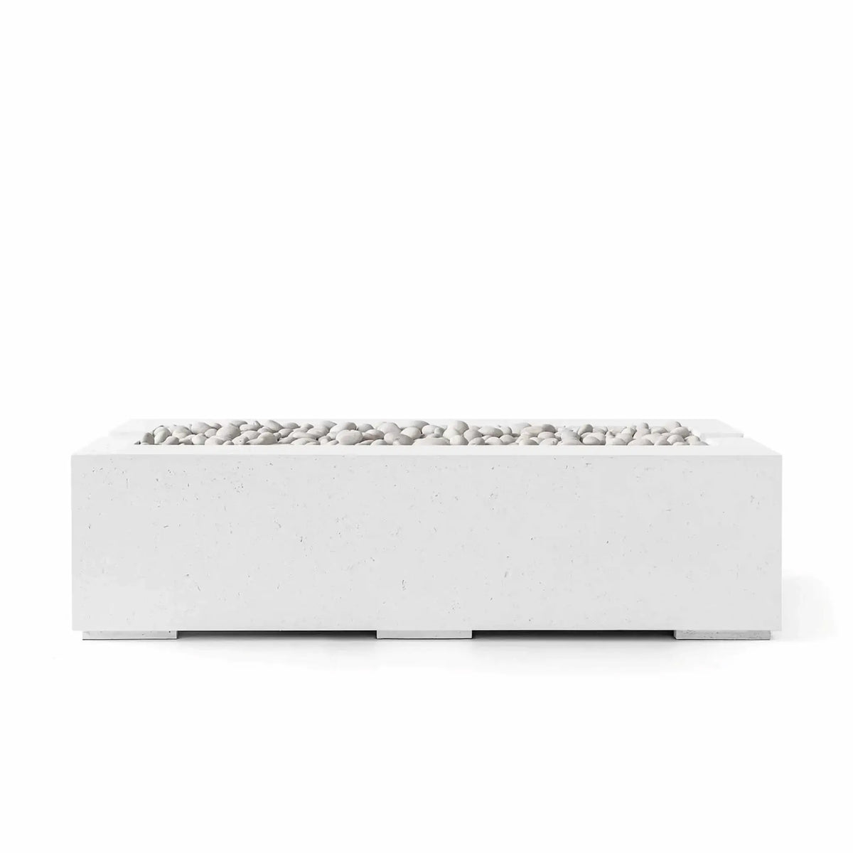 HPC Fire Hearth Products Controls Dekko GFRC Concrete Avera 60 x 26 Fire Pit shown in a Natural finish with Ivory Stone fire media. This contemporary rectangular outdoor fire pit features a durable GFRC concrete shell, recessed linear burner opening, and smooth white decorative stones that enhance its clean architectural appearance for luxury outdoor living and entertainment spaces.