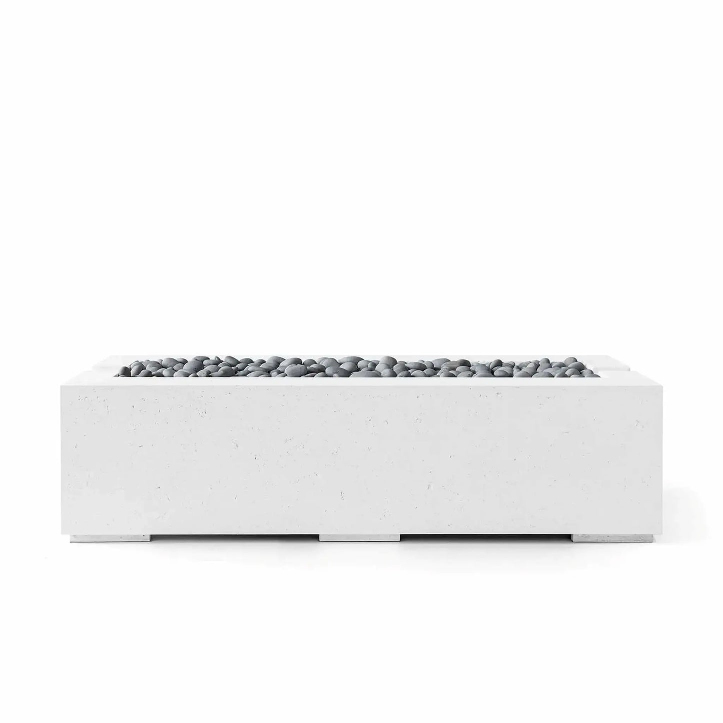 HPC Fire Hearth Products Controls Dekko GFRC Concrete Avera 60 x 26 Fire Pit shown in Natural finish with Slate Stone fire media. This modern rectangular fire feature combines a textured concrete exterior with smooth gray decorative stones arranged across the burner tray, offering a refined architectural appearance suited for luxury patios, outdoor lounges, and landscape design projects.