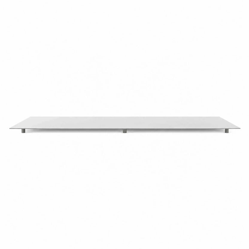 Main product image of the HPC Fire Hearth Products Controls Dekko GFRC Concrete Avera 60 x 26 Fire Pit table top lid shown separately on a white background. The rectangular stainless steel cover features a slim profile, support feet underneath for secure placement, and is designed to convert the Avera fire pit burner area into a functional tabletop surface when not in use.