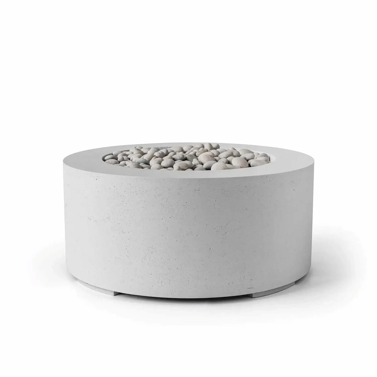 HPC Fire Hearth Products Controls Dekko GFRC Concrete Belmont Fire Pit in Ash finish featuring a modern 36-inch round GFRC concrete fire pit design. The recessed burner area is filled with smooth ivory stone media, creating a clean and contemporary appearance. Shown on a white background, this low-profile outdoor gas fire pit highlights the textured concrete surface, wide fire bowl rim, and minimalist architectural styling for patios, outdoor living spaces, and commercial landscapes.