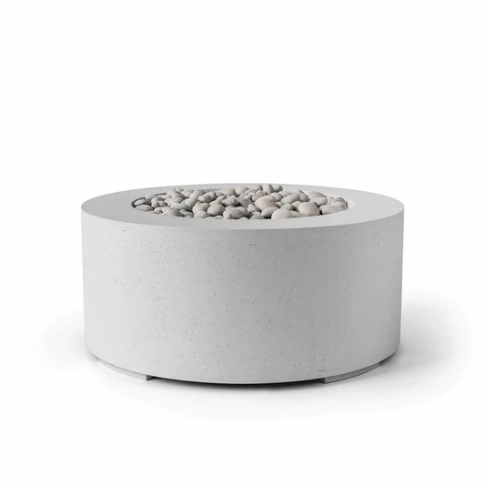 HPC Fire Hearth Products Controls Dekko GFRC Concrete Belmont Fire Pit in Ash finish featuring a modern 36-inch round GFRC concrete fire pit design. The recessed burner area is filled with smooth ivory stone media, creating a clean and contemporary appearance. Shown on a white background, this low-profile outdoor gas fire pit highlights the textured concrete surface, wide fire bowl rim, and minimalist architectural styling for patios, outdoor living spaces, and commercial landscapes.