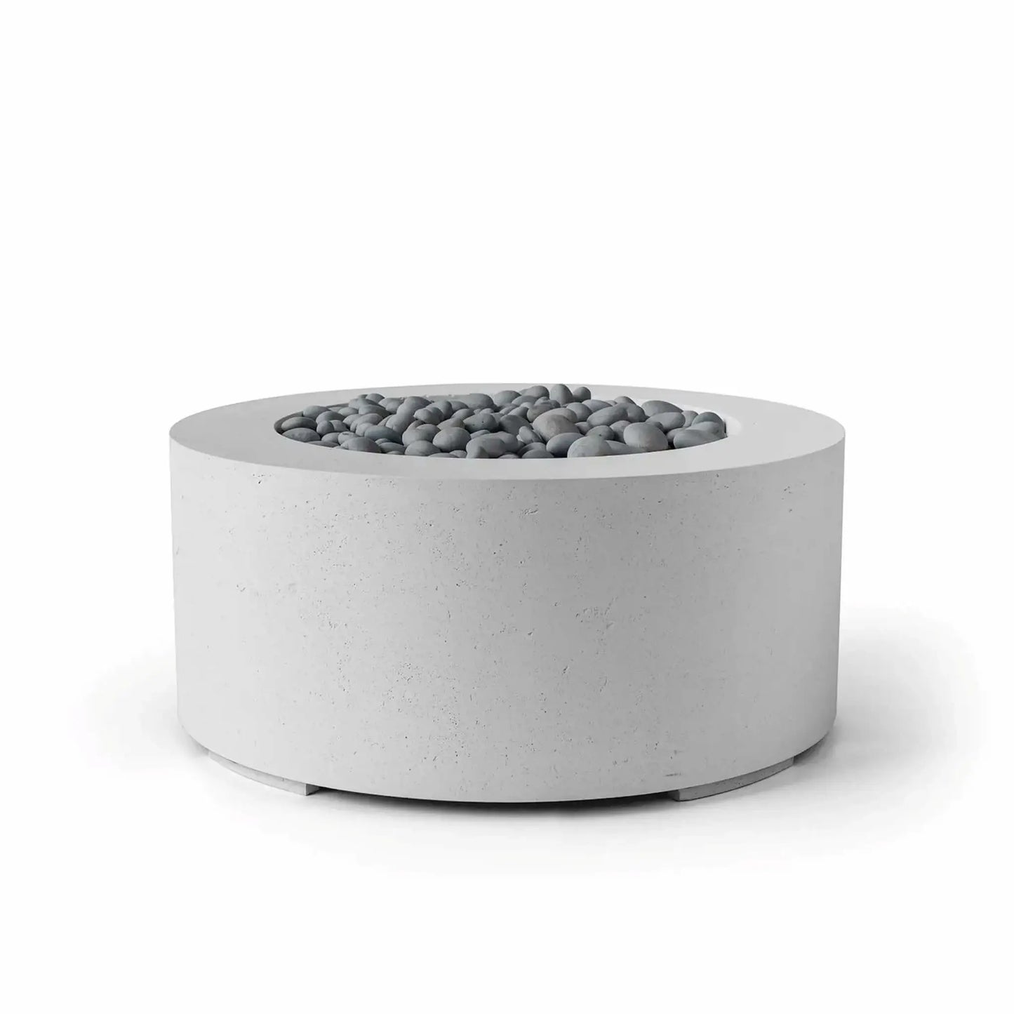 HPC Fire Hearth Products Controls Dekko GFRC Concrete Belmont Fire Pit in Ash finish showcasing decorative slate stone media within the recessed burner opening. The round GFRC concrete fire pit features a textured light-gray finish, broad top ledge, and contemporary low-profile silhouette. Designed for outdoor living environments, this Belmont fire pit combines modern architectural styling with durable materials for residential and commercial installations.