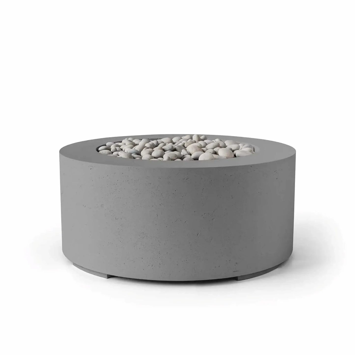 HPC Fire Hearth Products Controls Dekko GFRC Concrete Belmont Fire Pit in Charcoal finish with ivory stone fire media. This contemporary round fire pit features a dark charcoal concrete exterior, wide circular top, and recessed fire bowl filled with smooth decorative stones. The contrasting colors emphasize the modern GFRC construction and minimalist outdoor design, making it ideal for patios, decks, courtyards, and luxury outdoor living spaces.