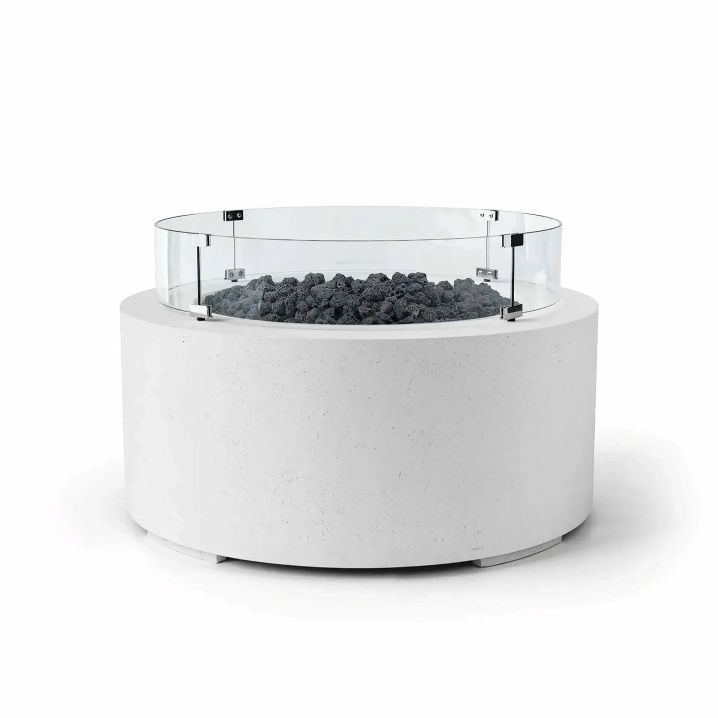 HPC Fire Hearth Products Controls Dekko GFRC Concrete Belmont Fire Pit in Natural finish featuring Lava Rock media and a Tempered Glass Wind Guard. This round outdoor fire pit combines a crisp white GFRC concrete body with rugged black lava rock and a transparent circular glass windscreen for added flame protection. The Belmont Fire Pit’s modern silhouette and contrasting materials create a striking focal point for patios and outdoor gathering areas.