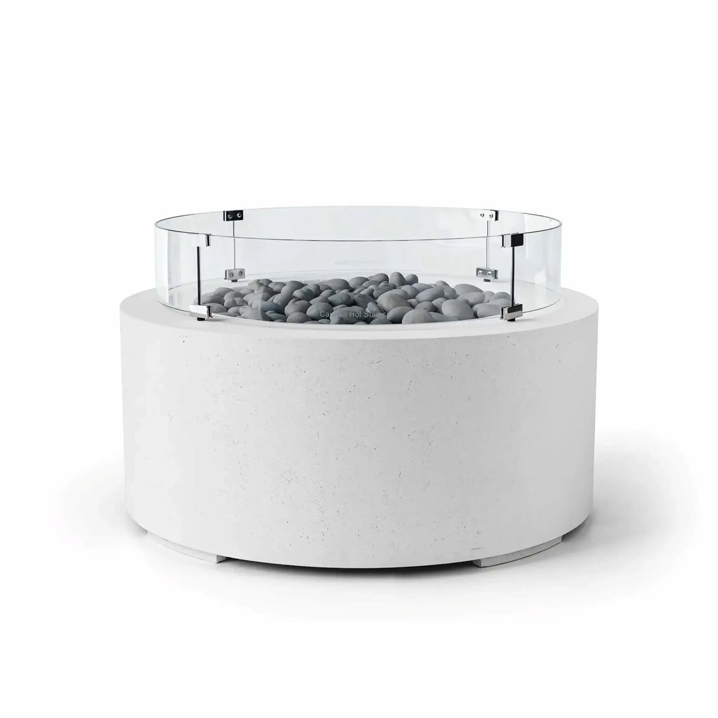 HPC Fire Hearth Products Controls Dekko GFRC Concrete Belmont Fire Pit in Natural finish with Slate Stone fire media and a Tempered Glass Wind Guard. The design features a white concrete cylindrical base, polished gray slate stones arranged around the burner opening, and a clear round glass windscreen secured by stainless steel supports. This Belmont Fire Pit blends contemporary styling, durable GFRC construction, and functional wind protection.