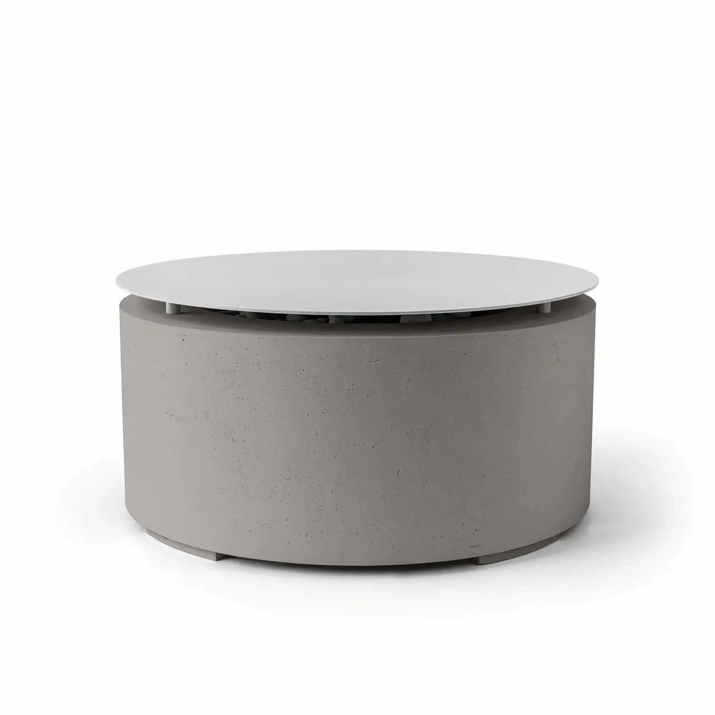 HPC Fire Hearth Products Controls Dekko GFRC Concrete Belmont Fire Pit in Sandstone finish with integrated Table Top Lid. This modern outdoor fire pit showcases a neutral sandstone-gray concrete finish, durable GFRC construction, and a circular cover that conceals the fire media area when not in use. The Belmont Fire Pit delivers both decorative appeal and practical tabletop functionality for upscale outdoor living environments.