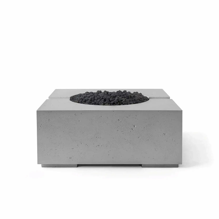 Product image of the Dekko GFRC Concrete Bravo 32 x 32 Fire Pit from HPC Fire Hearth Products Controls in Charcoal finish. The circular burner area is filled with black Lava Rock media, contrasting against the dark gray concrete body. The square fire pit features clean architectural lines and a contemporary design for outdoor entertainment spaces.