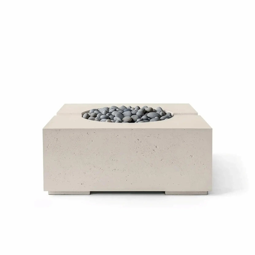 Dekko GFRC Concrete Bravo 32 x 32 Fire Pit from HPC Fire Hearth Products Controls shown in Clay finish with decorative Slate Stone media. This contemporary square outdoor fire pit features durable glass fiber reinforced concrete construction, a recessed circular burner compartment, textured finish details, and a clean modern design suitable for patios and outdoor seating areas.