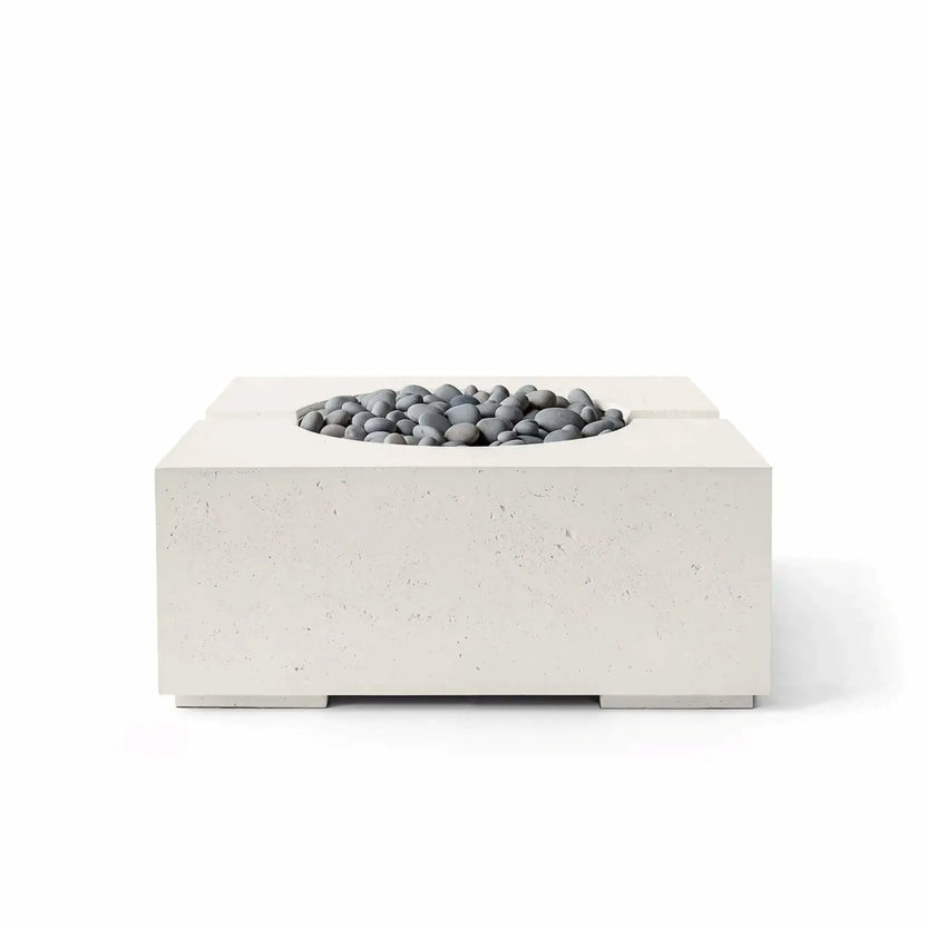 Product photograph of the Dekko GFRC Concrete Bravo 32 x 32 Fire Pit by HPC Fire Hearth Products Controls in a Limestone finish with decorative Slate Stone media. The contemporary square fire pit features a recessed circular fire bowl, textured concrete appearance, and smooth gray stones, making it an attractive centerpiece for modern patio and backyard installations.