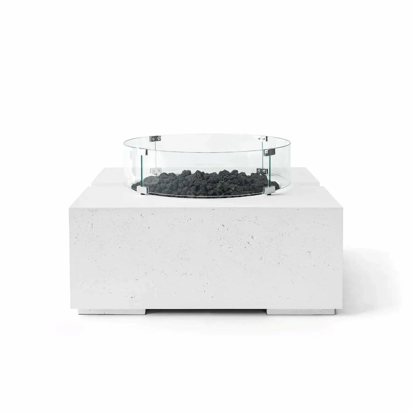 HPC Fire Hearth Products Controls Dekko GFRC Concrete Bravo 32 x 32 Fire Pit in Natural finish with black lava rock fire media and a tempered glass wind guard. The bright GFRC concrete construction contrasts sharply with the dark volcanic rock, emphasizing the fire pit’s modern square profile, textured surface, and clean outdoor living design.