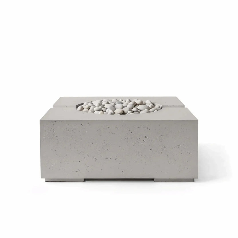 Front view of the HPC Fire Hearth Products Controls Dekko GFRC Concrete Bravo 32 x 32 Fire Pit in Sandstone finish featuring Ivory Stone fire media. The square fire pit showcases a warm sandstone-toned concrete exterior, durable GFRC construction, recessed circular burner compartment, and smooth ivory stones that enhance its elegant and versatile outdoor design.