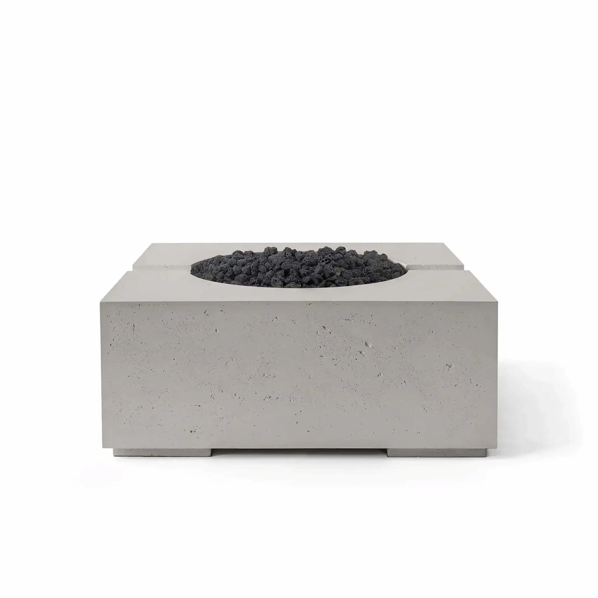 HPC Fire Hearth Products Controls Dekko GFRC Concrete Bravo 32 x 32 Fire Pit displayed in Sandstone finish with black Lava Rock media. The image highlights the fire pit’s contemporary square silhouette, textured GFRC concrete body, recessed burner opening, and dramatic contrast between the warm sandstone finish and dark volcanic rock fire media for upscale outdoor living areas.