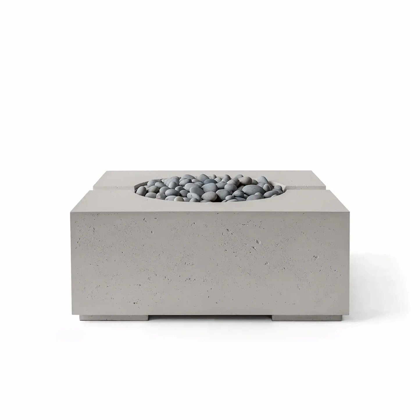 Product photograph of the Dekko GFRC Concrete Bravo 32 x 32 Fire Pit from HPC Fire Hearth Products Controls in Sandstone finish with decorative Slate Stone media. The square fire pit features a textured concrete surface, recessed circular fire bowl, smooth gray stones, and a warm neutral color palette, creating a sophisticated outdoor fire feature suitable for patios, decks, and landscape designs.