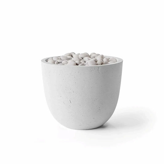 HPC Dekko GFRC Concrete Element 20 Round Fire Column in Ash finish, displayed with smooth ivory fire stones filling the burner opening. The modern bowl-shaped fire feature showcases a light gray concrete texture with subtle surface variations and a clean contemporary design. Product image isolated on a white background, highlighting the combination of Ash GFRC concrete and decorative ivory fire media.