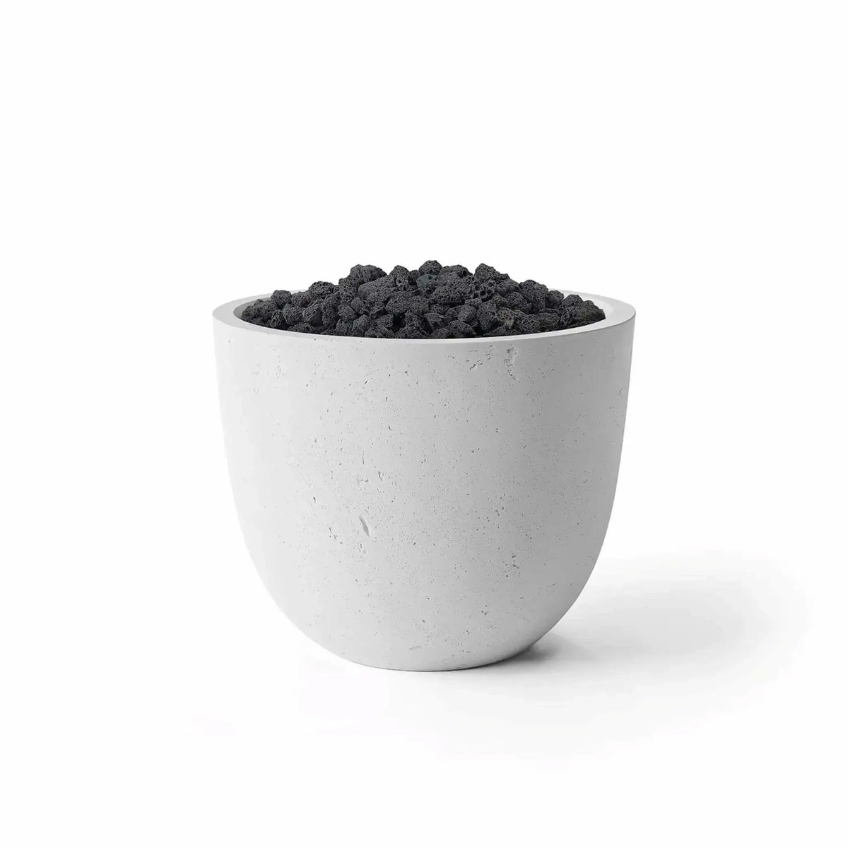 HPC Dekko GFRC Concrete Element 20 Round Fire Column featuring an Ash concrete finish paired with natural black lava rock media. The rounded fire column has a sleek, modern silhouette with a textured gray GFRC concrete exterior and a recessed burner area filled with porous volcanic rock. Studio-style product image on a white background emphasizing the Ash and Lava Rock fire feature combination.