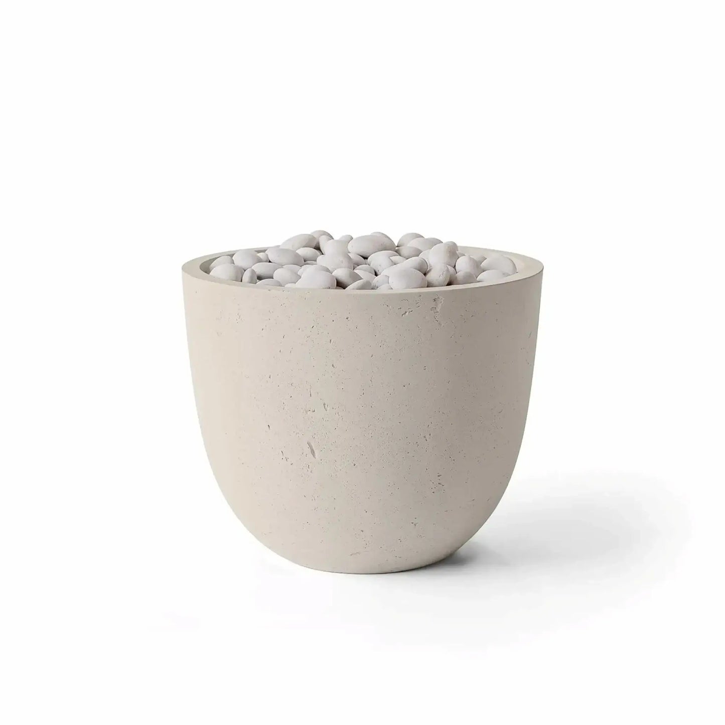 HPC Dekko GFRC Concrete Element 20 Round Fire Column in a warm Clay finish with decorative Ivory Stone fire media. The rounded concrete fire feature showcases a soft beige GFRC exterior, subtle handcrafted texture, and smooth white stones filling the burner opening. Clean product photography on a white background emphasizing the Clay and Ivory Stone combination for modern outdoor living spaces.