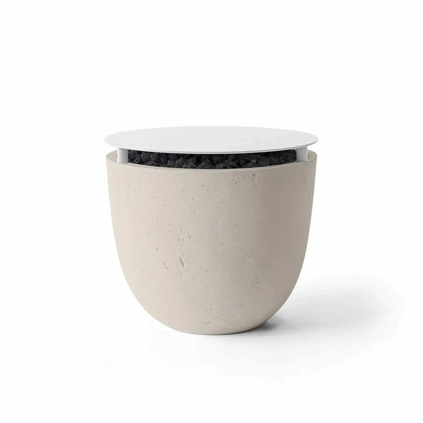 HPC Fire Hearth Products Controls Dekko GFRC Concrete Element 20 Round Fire Column Clay Table Top Lid featuring a warm clay-colored concrete finish and matching round tabletop cover. Decorative black lava rock media is visible beneath the lid, emphasizing the fire column’s convertible design. This product image highlights the durable GFRC construction, smooth rounded shape, and practical tabletop accessory for modern outdoor living spaces.