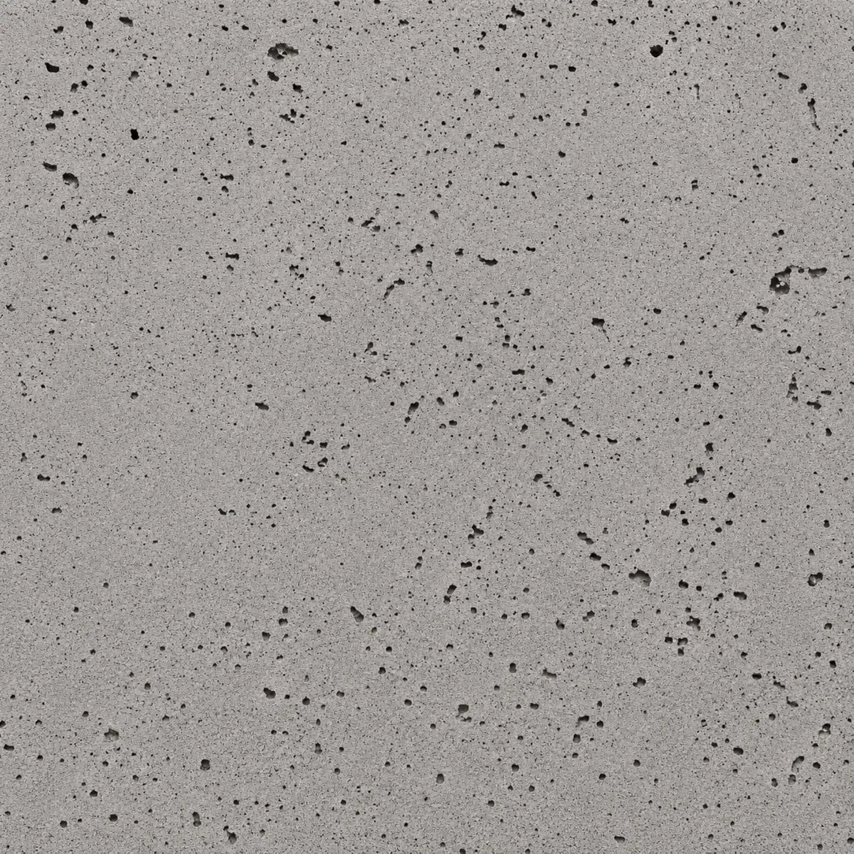HPC Fire Hearth Products Dekko GFRC Concrete Fire Pit Sandstone finish swatch featuring a light warm-gray concrete texture with visible pores, natural imperfections, and soft tonal variation. This versatile Sandstone GFRC concrete finish provides a contemporary yet organic appearance for outdoor fire pits, fire tables, patio gathering areas, and residential landscape fire features.