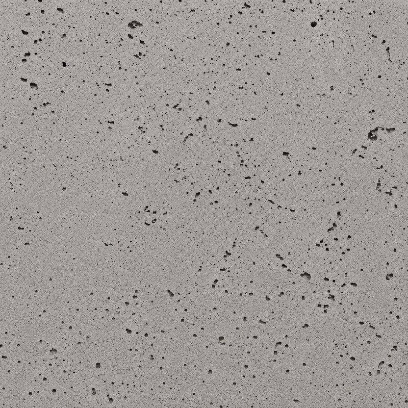 HPC Fire Hearth Products Dekko GFRC Concrete Fire Pit Sandstone finish swatch featuring a light warm-gray concrete texture with visible pores, natural imperfections, and soft tonal variation. This versatile Sandstone GFRC concrete finish provides a contemporary yet organic appearance for outdoor fire pits, fire tables, patio gathering areas, and residential landscape fire features.