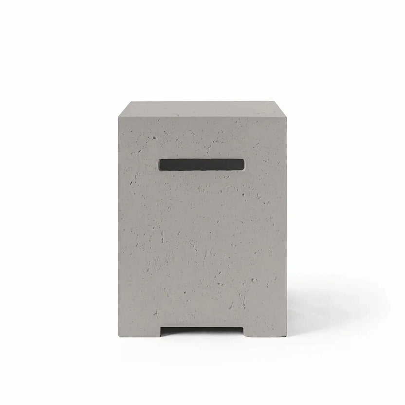 HPC Fire Hearth Products Controls Dekko GFRC Concrete Propane Tank Cover in Sandstone finish, displayed in a front-facing product image with a white background. The cover showcases a warm light gray-beige concrete color, authentic GFRC texture, modern geometric shape, and recessed handle opening. Designed to discreetly store propane tanks, it enhances the appearance of outdoor fire pits, fire tables, and contemporary patio living areas.