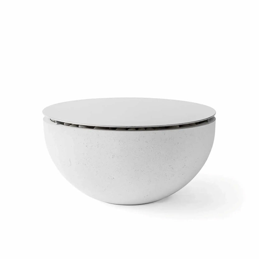 HPC Fire Hearth Products Controls Dekko GFRC Concrete Serenade 32 Fire Pit in Ash finish with matching Table Top Lid installed. The smooth round metal cover sits securely over the fire pit opening, creating a sleek outdoor coffee table appearance. Displayed on a white background, the image showcases the Ash-colored GFRC concrete bowl, subtle concrete texture, and the functional tabletop conversion accessory for the Serenade 32 fire pit.