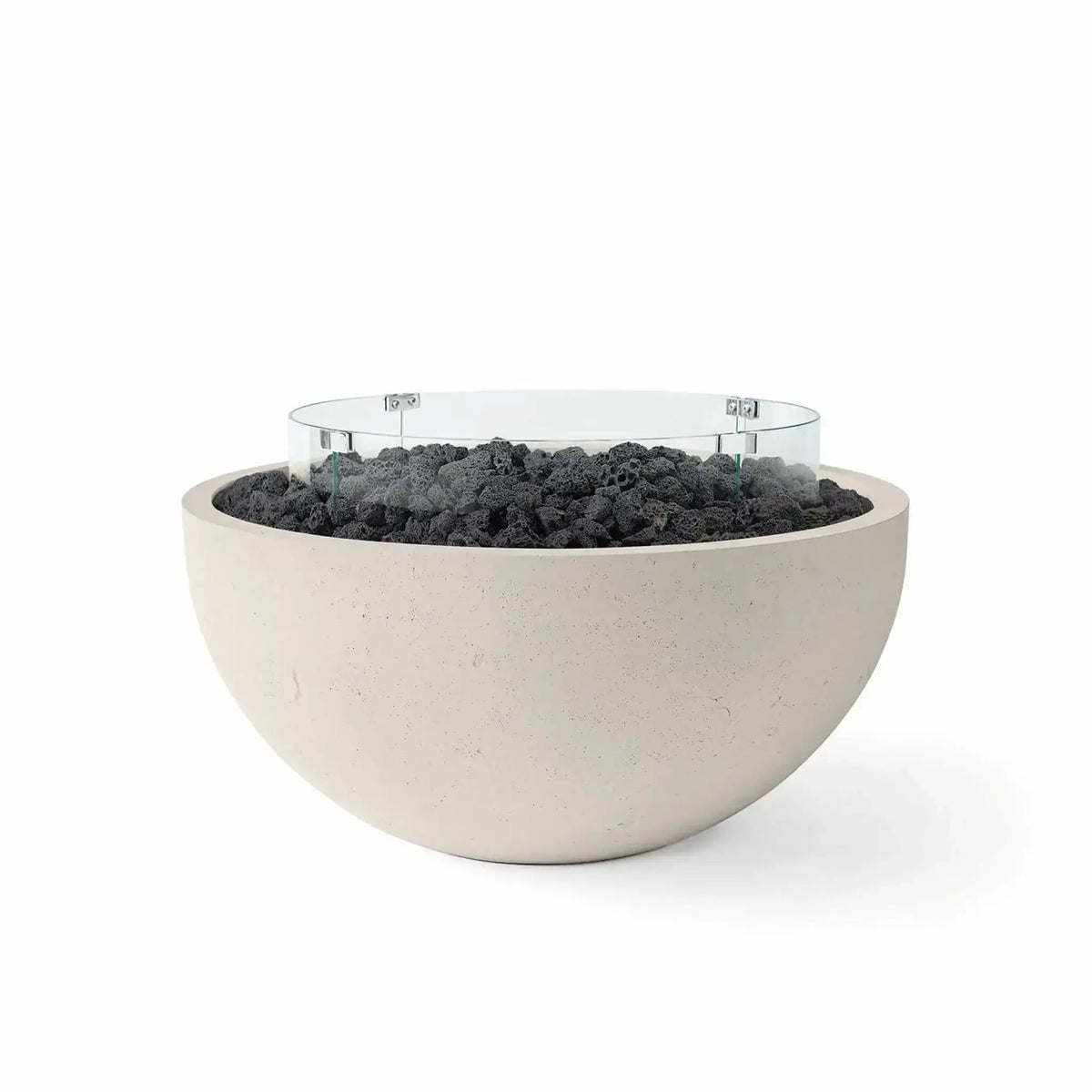 HPC Fire Hearth Products Controls Dekko GFRC Concrete Serenade 32 Fire Pit in Clay finish with black lava rock media and a tempered glass wind guard. This modern bowl-style outdoor fire pit showcases a warm concrete exterior, durable GFRC construction, and natural volcanic rock fill, offering a striking contemporary fire feature for patios, outdoor living rooms, and landscape designs.