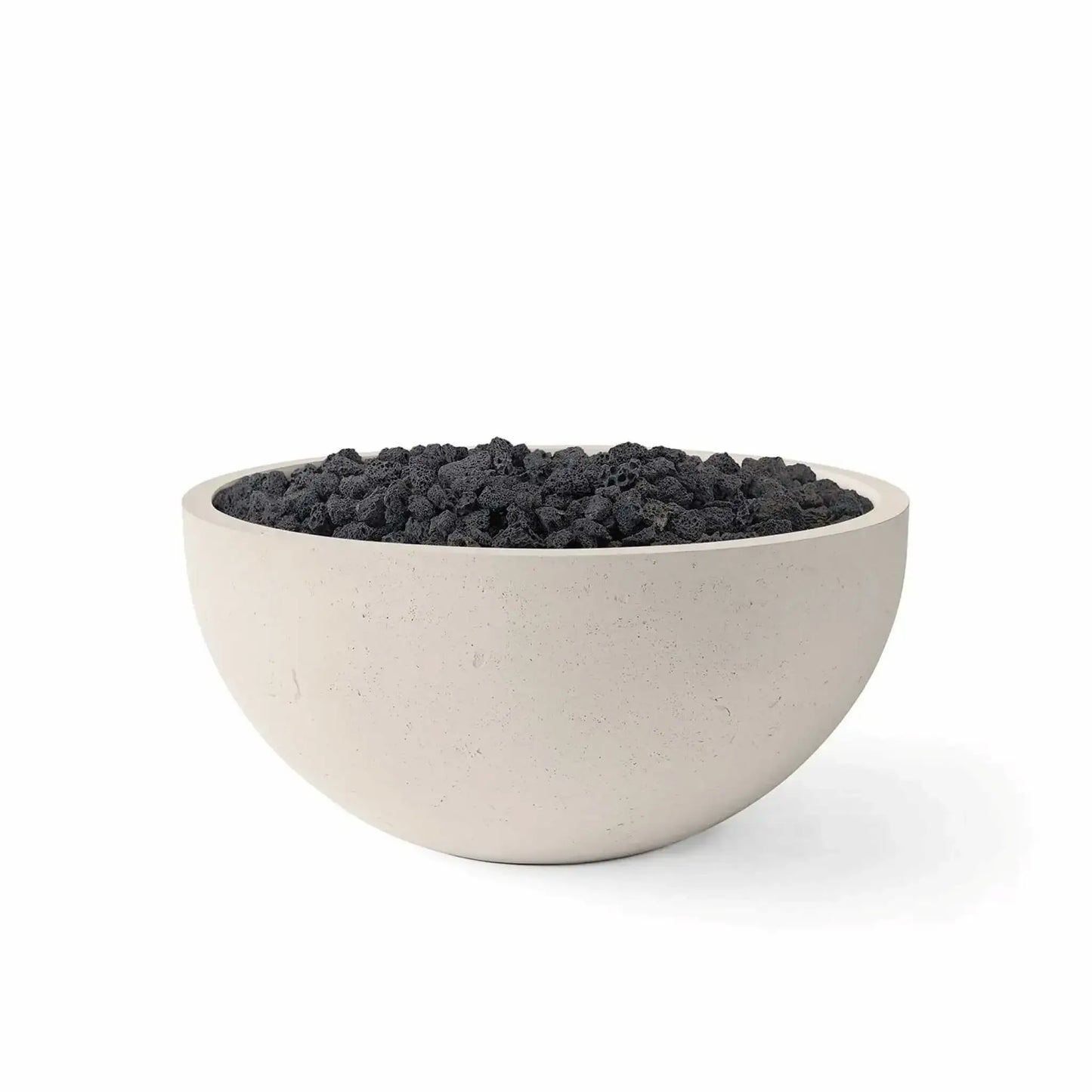 HPC Fire Hearth Products Controls Dekko GFRC Concrete Serenade 32 Fire Pit finished in Clay with black lava rock fire media. The bowl-shaped GFRC concrete fire pit features a soft beige exterior, broad fire media opening, and rugged volcanic lava rocks that create natural texture and contrast. Product image isolated on a white background, highlighting the modern design for outdoor entertainment and patio fire features.