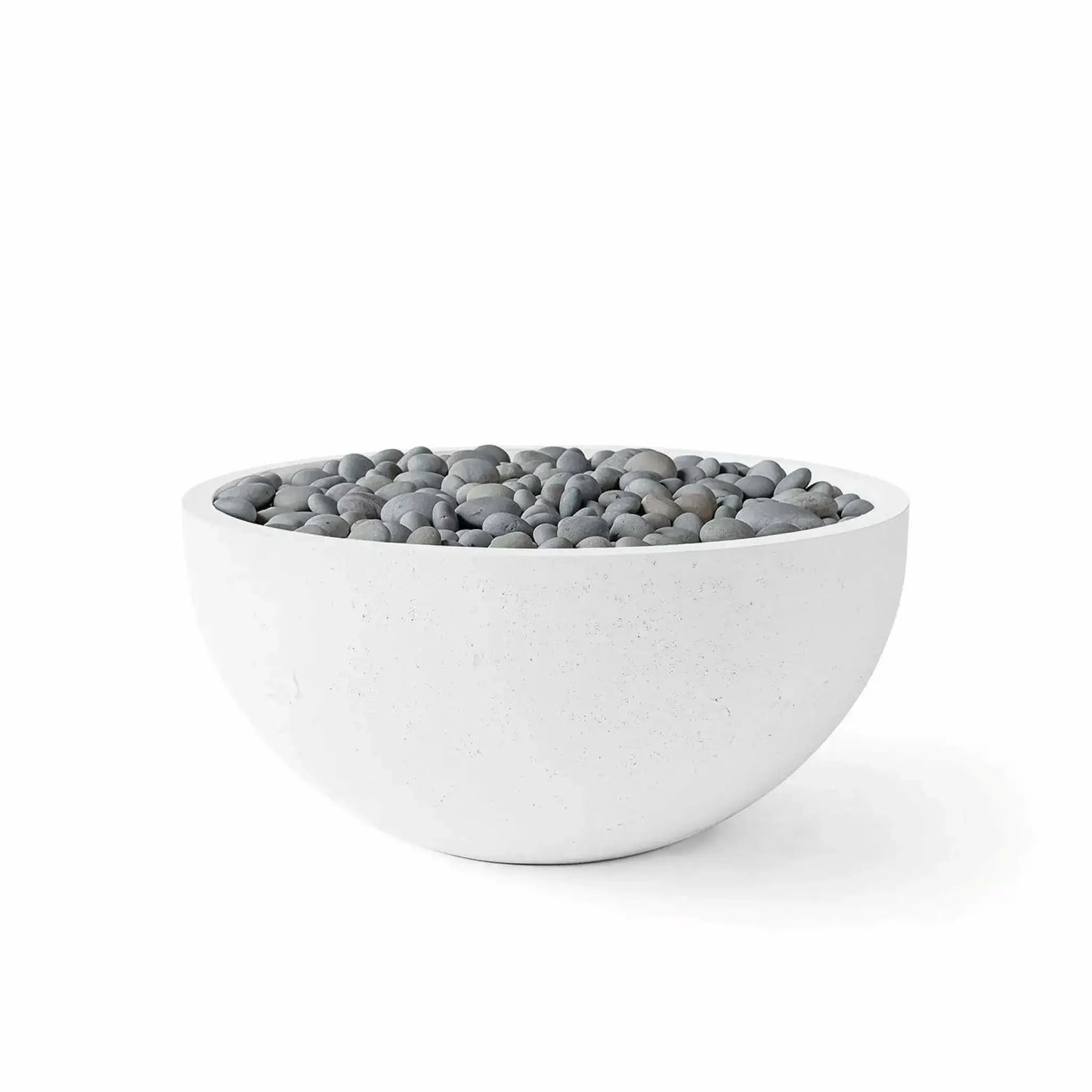 HPC Fire Hearth Products Controls Dekko GFRC Concrete Serenade 32 Fire Pit in Natural finish with Slate Stone media. The bowl-shaped GFRC concrete fire feature is filled with smooth gray slate stones that complement the natural concrete exterior. Displayed against a white background, this product image showcases a balanced, contemporary design suitable for modern patios, pool decks, and outdoor gathering spaces.