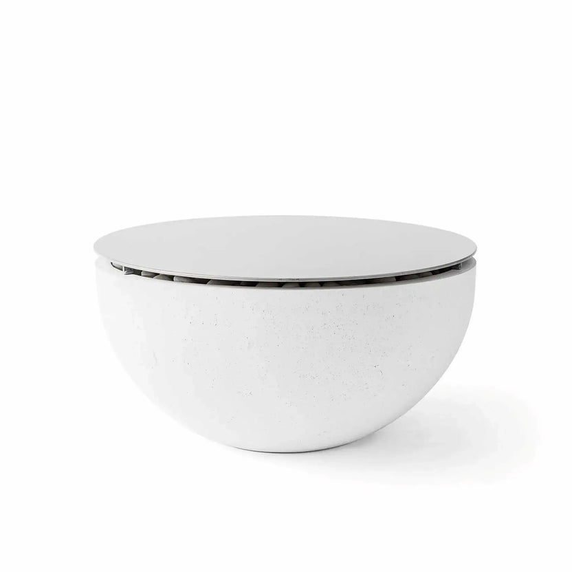 HPC Fire Hearth Products Controls Dekko GFRC Concrete Serenade 32 Fire Pit in Natural finish equipped with a Table Top Lid. The soft gray concrete fire bowl is transformed into a clean, contemporary outdoor table with the addition of the round metal cover. Set against a white background, the image highlights the Natural GFRC finish, smooth bowl shape, and functional tabletop accessory for the Serenade 32 collection.