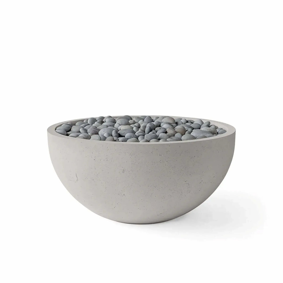 HPC Fire Hearth Products Controls Dekko GFRC Concrete Serenade 32 Fire Pit in Sandstone finish with Slate Stone media. The bowl-shaped GFRC concrete fire pit showcases a soft sandstone-toned exterior filled with smooth gray slate stones, offering a refined blend of natural textures and modern design. Presented on a white background, this product image emphasizes the Serenade 32 Fire Pit’s durable construction, rounded silhouette, and versatile slate stone media option for upscale patio and backyard installa