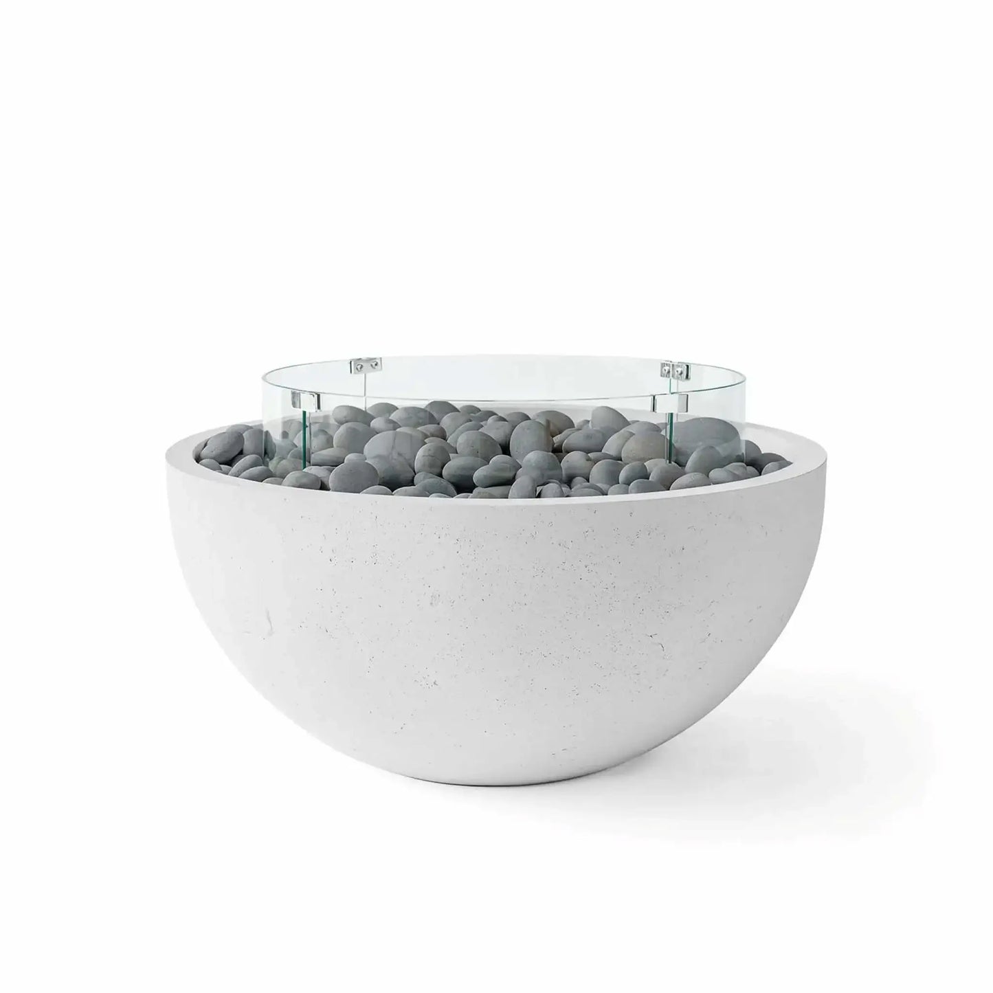 HPC Fire Hearth Products Controls Dekko GFRC Concrete Serenade 40 Fire Pit finished in Ash with decorative slate stone fire media and a clear tempered glass wind guard. The contemporary concrete fire bowl features smooth rounded edges, durable GFRC construction, gray polished stones surrounding the burner area, and a circular glass windscreen, creating a refined focal point for modern patios and outdoor entertaining areas.