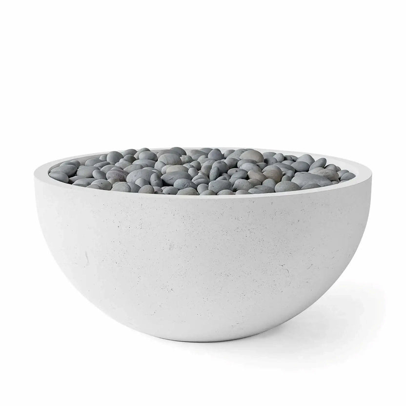 HPC Fire Hearth Products Controls Dekko GFRC Concrete Serenade 40 Fire Pit in Ash finish with decorative slate stone media. The modern round fire pit bowl features durable GFRC concrete construction, a light gray textured finish, and smooth river-style slate stones arranged across the burner area. Clean product photography on a white background showcases the contemporary outdoor fire feature for patios and residential landscape designs.