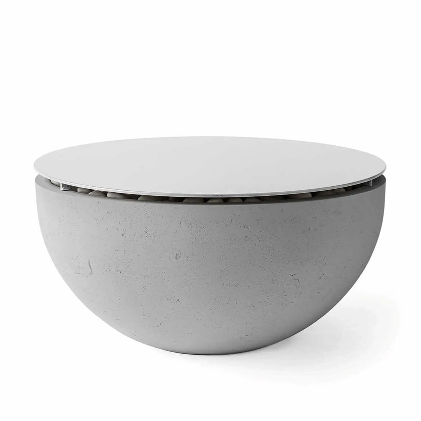 HPC Fire Hearth Products Controls Dekko GFRC Concrete Serenade 40 Fire Pit Charcoal Table Top Lid displayed on a charcoal-finished GFRC concrete fire pit. The circular lid sits securely over the burner opening, converting the fire feature into a versatile outdoor coffee table. The sleek bowl-shaped design and dark charcoal finish complement modern patios and contemporary outdoor living spaces.