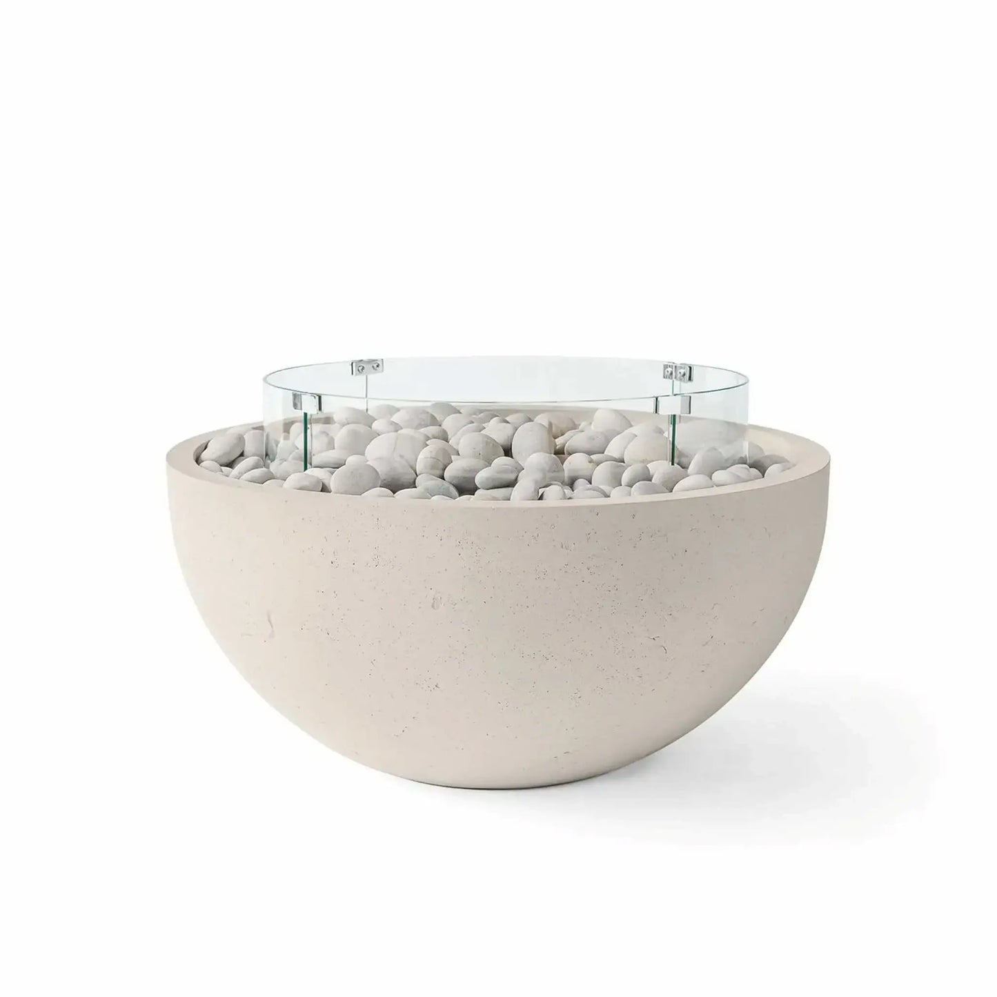 HPC Fire Hearth Products Controls Dekko GFRC Concrete Serenade 40 Fire Pit in Clay finish featuring ivory stone fire media and a clear tempered glass wind guard. The warm clay-colored concrete bowl is filled with decorative white river stones and surrounded by a circular glass flame barrier, creating a sophisticated outdoor fire feature suited for contemporary and transitional patio environments.
