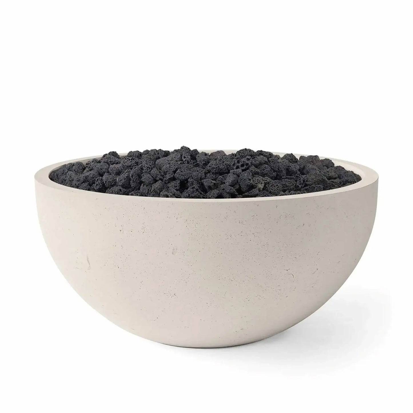 HPC Fire Hearth Products Controls Dekko GFRC Concrete Serenade 40 Fire Pit in Clay finish filled with black lava rock. This modern round GFRC concrete fire bowl features a warm beige exterior, durable concrete construction, and rugged volcanic fire media. Clean studio photography highlights the contrast between the light clay finish and dark lava rock, creating a stylish outdoor centerpiece for patios and entertaining spaces.