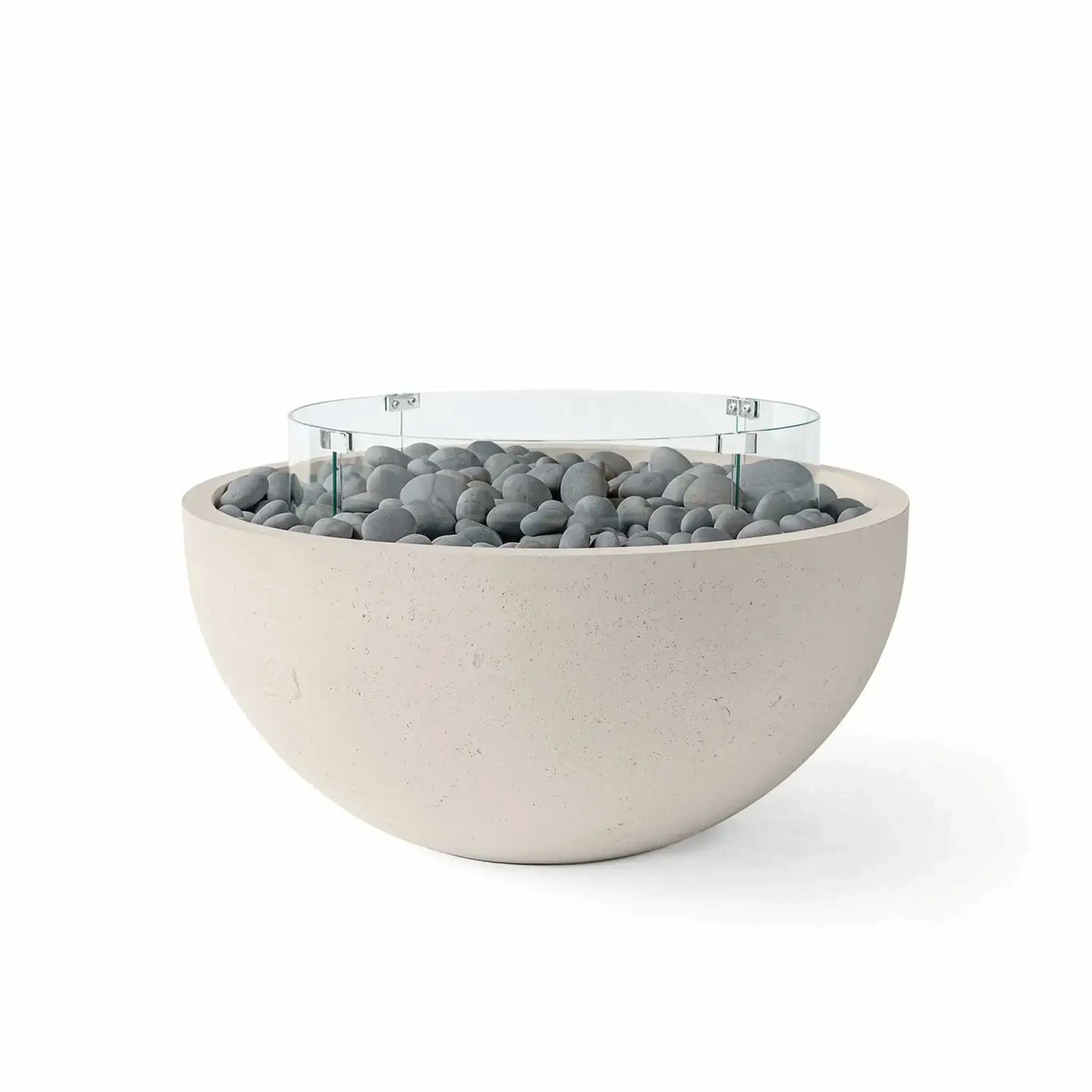 HPC Fire Hearth Products Controls Dekko GFRC Concrete Serenade 40 Fire Pit in Clay finish featuring slate stone fire media and a clear tempered glass wind guard. The rounded concrete bowl design highlights smooth gray decorative stones, a textured GFRC exterior, and a transparent circular windscreen, offering a clean and inviting fire feature for patios, decks, and outdoor lounge areas.
