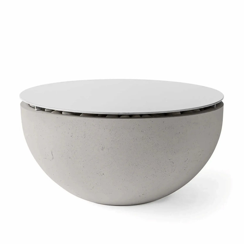 HPC Fire Hearth Products Controls Dekko GFRC Concrete Serenade 40 Fire Pit Sandstone Table Top Lid shown on a sandstone-colored GFRC concrete fire pit. The circular tabletop cover conceals the burner compartment and converts the fire feature into a usable outdoor table. The warm sandstone finish and minimalist bowl silhouette are ideal for upscale patios and outdoor gathering spaces.