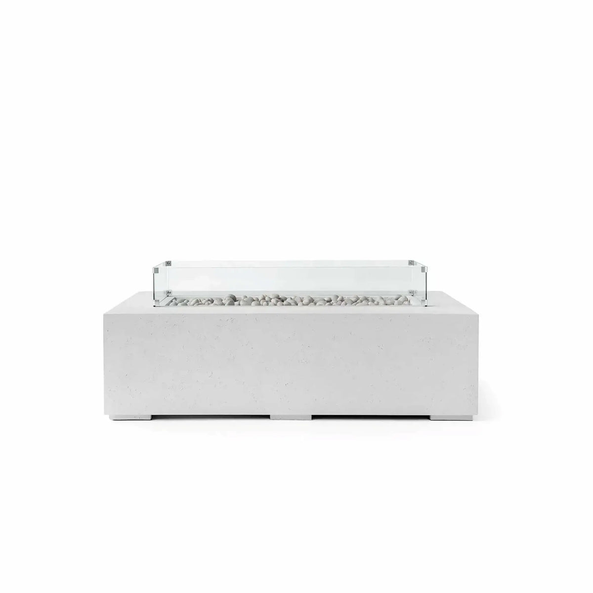 HPC Fire Hearth Products Controls Dekko GFRC Concrete Sonoma 56 x 30 Fire Pit in Ash finish featuring Ivory Stone media and a tempered glass wind guard. This rectangular outdoor fire pit showcases a smooth GFRC concrete body, contemporary low-profile design, and a linear burner area filled with decorative ivory stones. The clear glass wind guard surrounds the burner opening for added flame protection while maintaining a clean, modern appearance suitable for patios and outdoor living spaces.