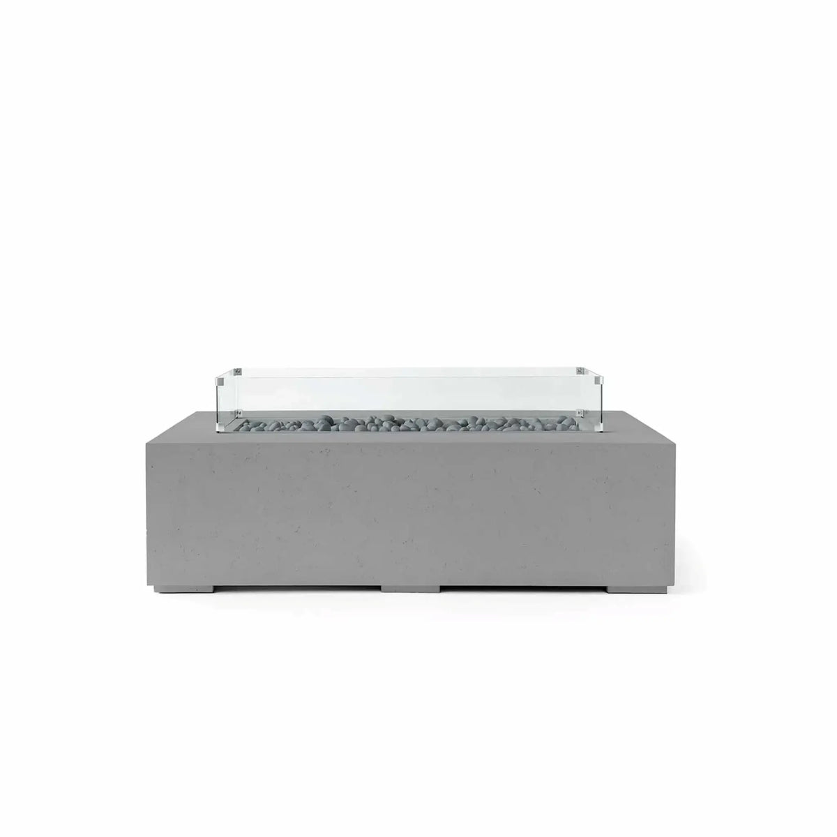 HPC Fire Hearth Products Controls Dekko GFRC Concrete Sonoma 56 x 30 Fire Pit in Charcoal finish with Slate Stone media and a tempered glass wind guard. The rectangular outdoor fire pit showcases a durable GFRC concrete construction, decorative gray slate stones within the linear burner channel, and a clear wind guard mounted above the fire area. Its modern silhouette and neutral charcoal tone make it a versatile addition to contemporary outdoor seating and entertainment spaces.