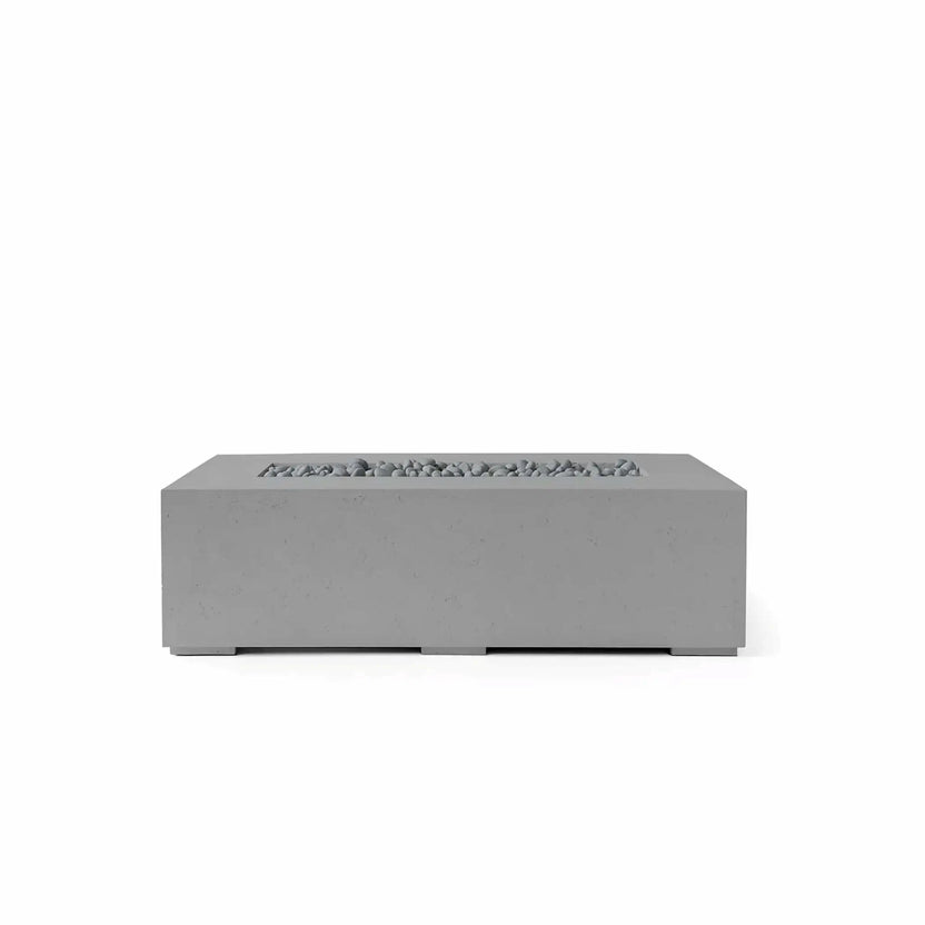 HPC Fire Hearth Products Controls Dekko GFRC Concrete Sonoma 56 x 30 Fire Pit in Charcoal finish with decorative Slate Stone media. The rectangular fire feature showcases a dark gray concrete-look body, recessed burner cavity, and gray stone fill for a sophisticated modern appearance. Designed for outdoor use, this Sonoma GFRC fire pit serves as a stylish focal point for contemporary patios, decks, and outdoor living spaces.