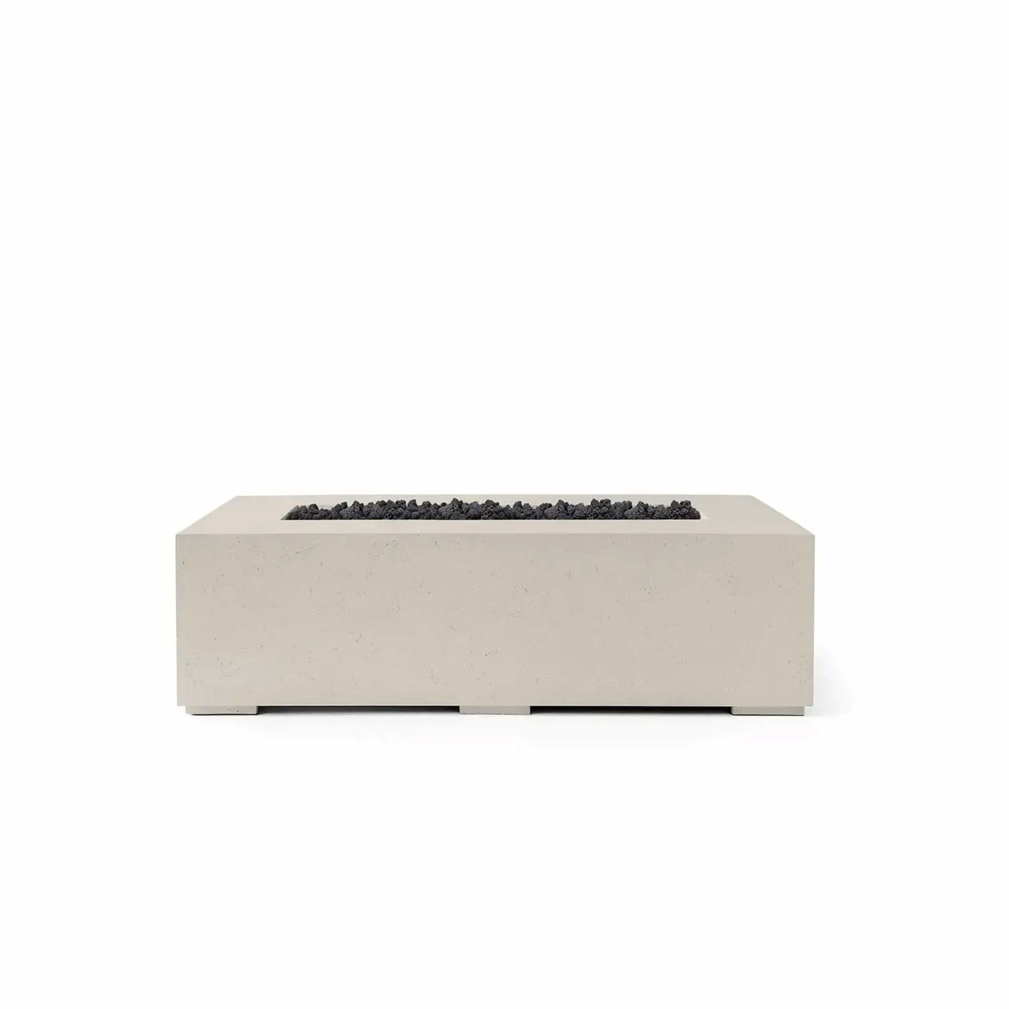 HPC Fire Hearth Products Controls Dekko GFRC Concrete Sonoma 56 x 30 Fire Pit in Clay finish with black Lava Rock media. This modern rectangular fire pit combines a warm-toned GFRC concrete body with dark volcanic rock in the burner channel, creating strong visual contrast. The streamlined profile, recessed burner design, and durable outdoor construction make it a stylish centerpiece for patios, terraces, and outdoor entertainment spaces.