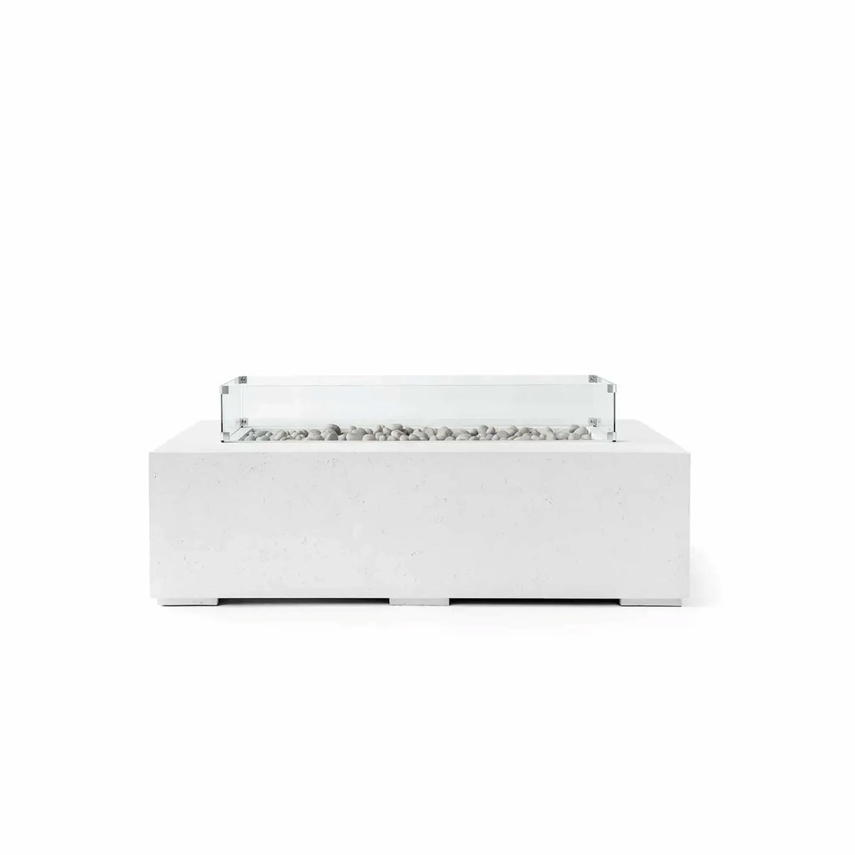 HPC Fire Hearth Products Controls Dekko GFRC Concrete Sonoma 56 x 30 Fire Pit in Natural finish featuring Ivory Stone media and a tempered glass wind guard. The clean-lined rectangular fire pit combines a natural concrete appearance with decorative ivory stones arranged across the linear burner channel. A transparent wind guard surrounds the burner opening, creating a refined outdoor fire feature suited for patios, courtyards, and luxury backyard gathering spaces.