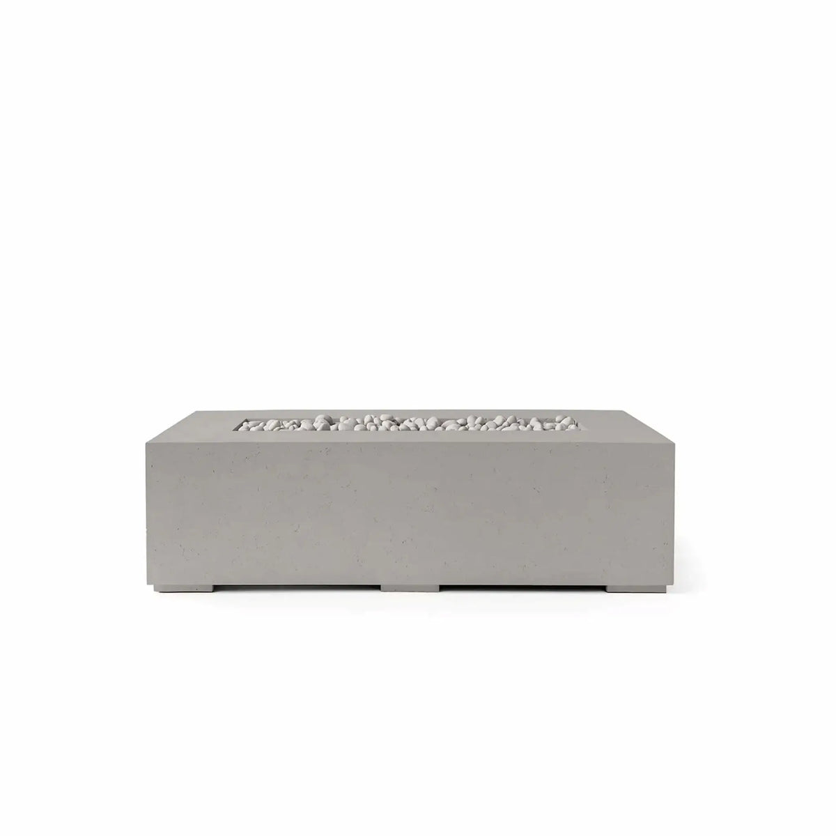 HPC Fire Hearth Products Controls Dekko GFRC Concrete Sonoma 56 x 30 Fire Pit in Sandstone finish featuring Ivory Stone media. This rectangular outdoor gas fire pit combines a warm sandstone-colored GFRC concrete body with smooth ivory fire stones arranged within the recessed linear burner area. The clean, modern profile and durable construction make the Sonoma fire pit an elegant focal point for patios, poolside seating areas, and upscale outdoor entertaining spaces.