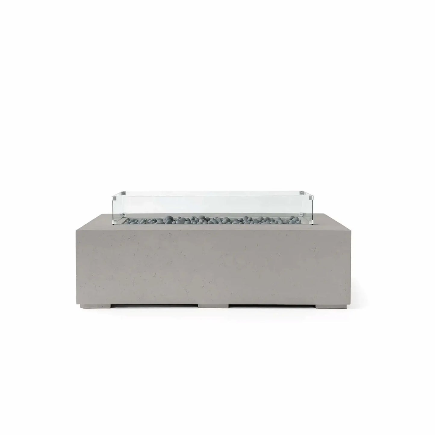 HPC Fire Hearth Products Controls Dekko GFRC Concrete Sonoma 56 x 30 Fire Pit in Sandstone finish with Slate Stone media and a tempered glass wind guard. The rectangular fire pit features durable GFRC concrete construction, decorative gray slate stones within the linear burner opening, and a clear wind guard mounted above the fire area. Its warm sandstone tone and modern silhouette make it a stylish centerpiece for patios, terraces, and outdoor conversation spaces.