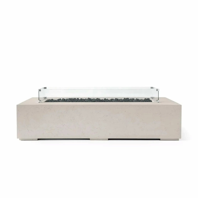 HPC Fire Hearth Products Controls Dekko GFRC Concrete Sonoma 72 x 33 Fire Pit in Clay finish with black lava rock media and a tempered glass wind guard. This elongated rectangular GFRC concrete fire pit showcases clean lines, durable construction, and a contemporary aesthetic, making it an attractive focal point for outdoor living and gathering areas.