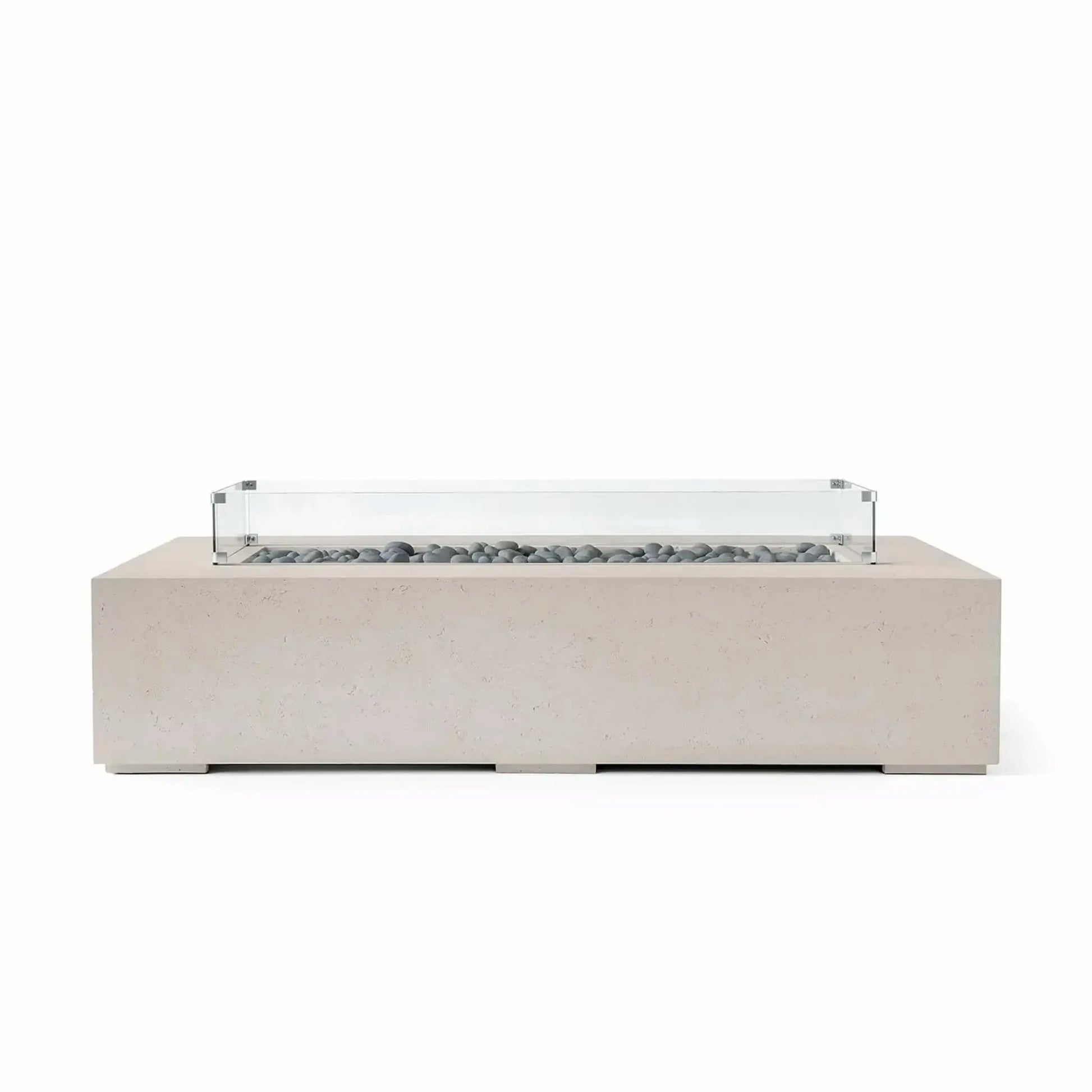 HPC Fire Hearth Products Controls Dekko GFRC Concrete Sonoma 72 x 33 Fire Pit in Clay finish featuring gray slate stone fire media beneath a clear tempered glass wind guard. The low-profile rectangular design and textured concrete construction provide a modern architectural look that complements luxury patios, outdoor lounges, and backyard entertainment settings.