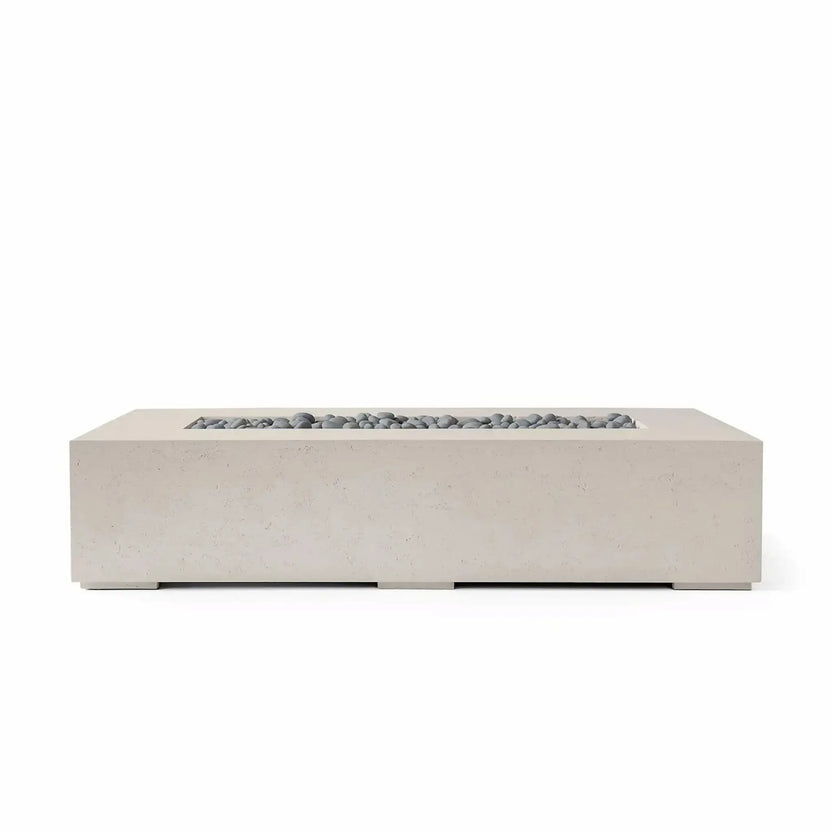 HPC Fire Hearth Products Controls Dekko GFRC Concrete Sonoma 72 x 33 Fire Pit in Clay finish featuring gray slate stone fire media beneath a clear tempered glass wind guard. The low-profile rectangular design and textured concrete construction provide a modern architectural look that complements luxury patios, outdoor lounges, and backyard entertainment settings.