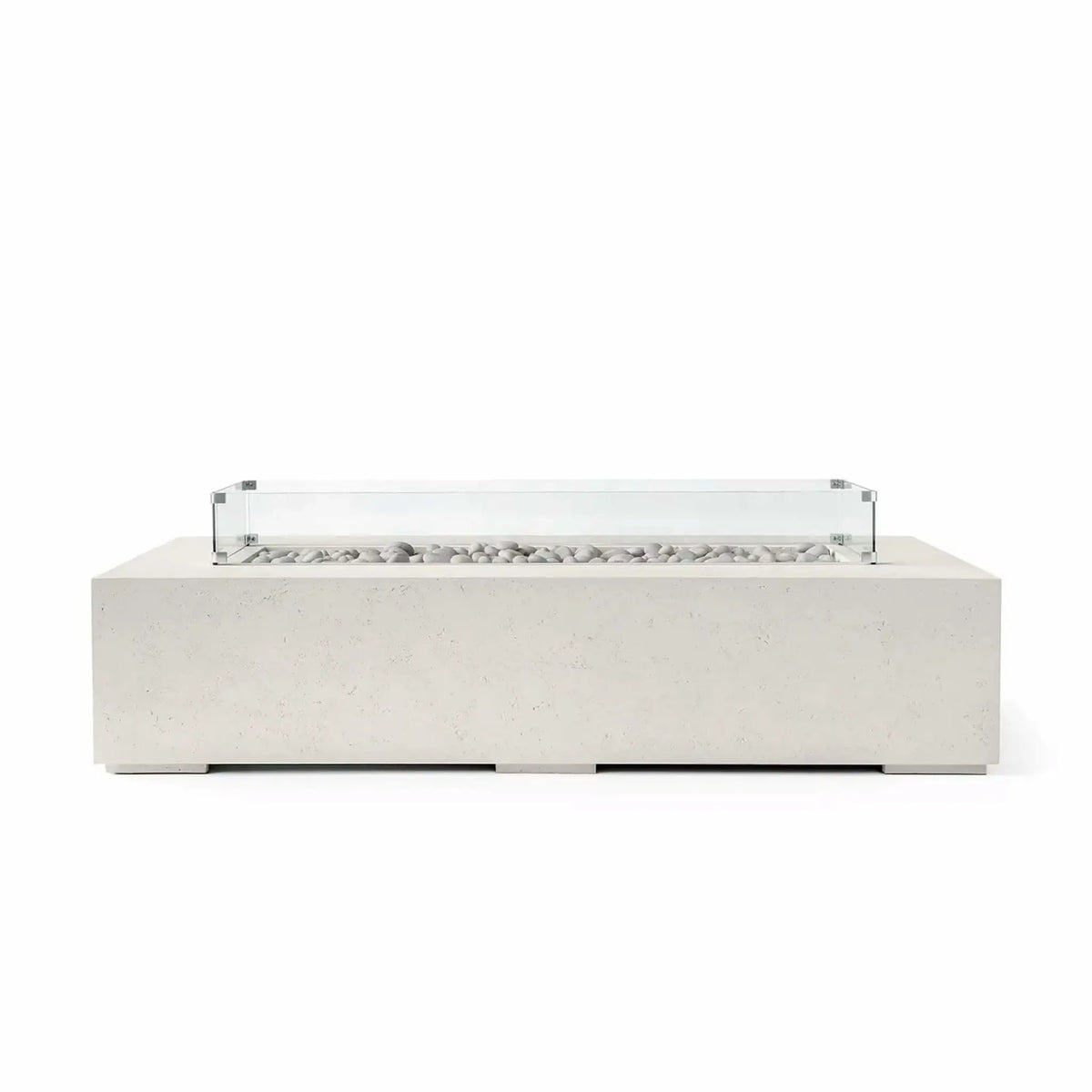 HPC Fire Hearth Products Controls Dekko GFRC Concrete Sonoma 72 x 33 Fire Pit in Limestone finish with ivory fire stones and a tempered glass wind guard. The light-colored concrete body, clean rectangular profile, and decorative stone media create a bright contemporary outdoor fire feature designed to serve as an elegant centerpiece for patios, decks, and upscale outdoor living spaces.